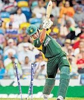 Rattle of timber:  Pakistans Kamran Akmal is getting clean bowled by New Zealand pacer Kyle Mills on Saturday. AP