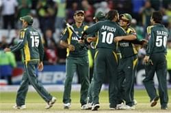 Pakistan players including man of the match Shahid Afridi, centre right, celebrate their semi-final win over South Africa. AP