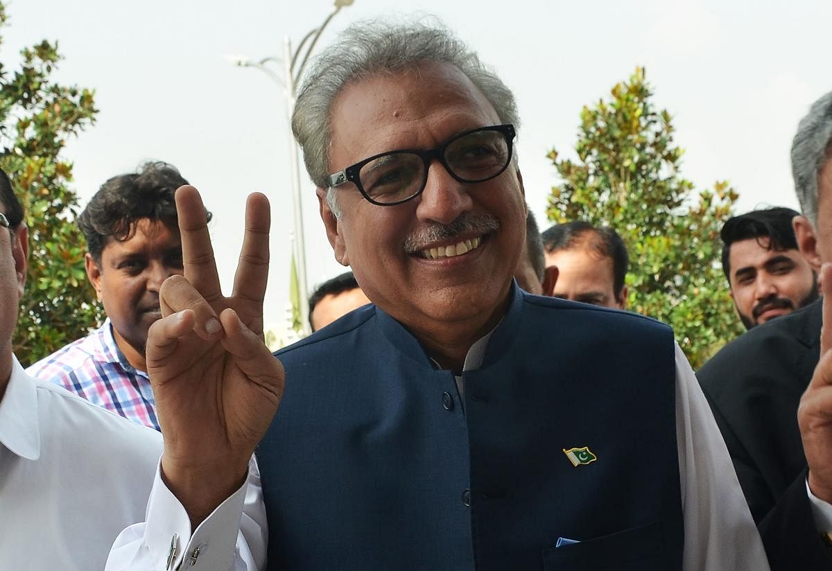 Dr Alvi had defeated Pakistan Peoples Party candidate Aitzaz Ahsan and the Pakistan Muslim League-N nominee Maulana Fazl ur Rehman in a three-way presidential contest. AFP file photo