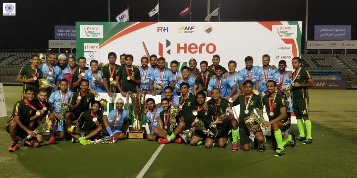 India and Pakistan players with the Asian Champions Trophy. HOCKEY INDIA  