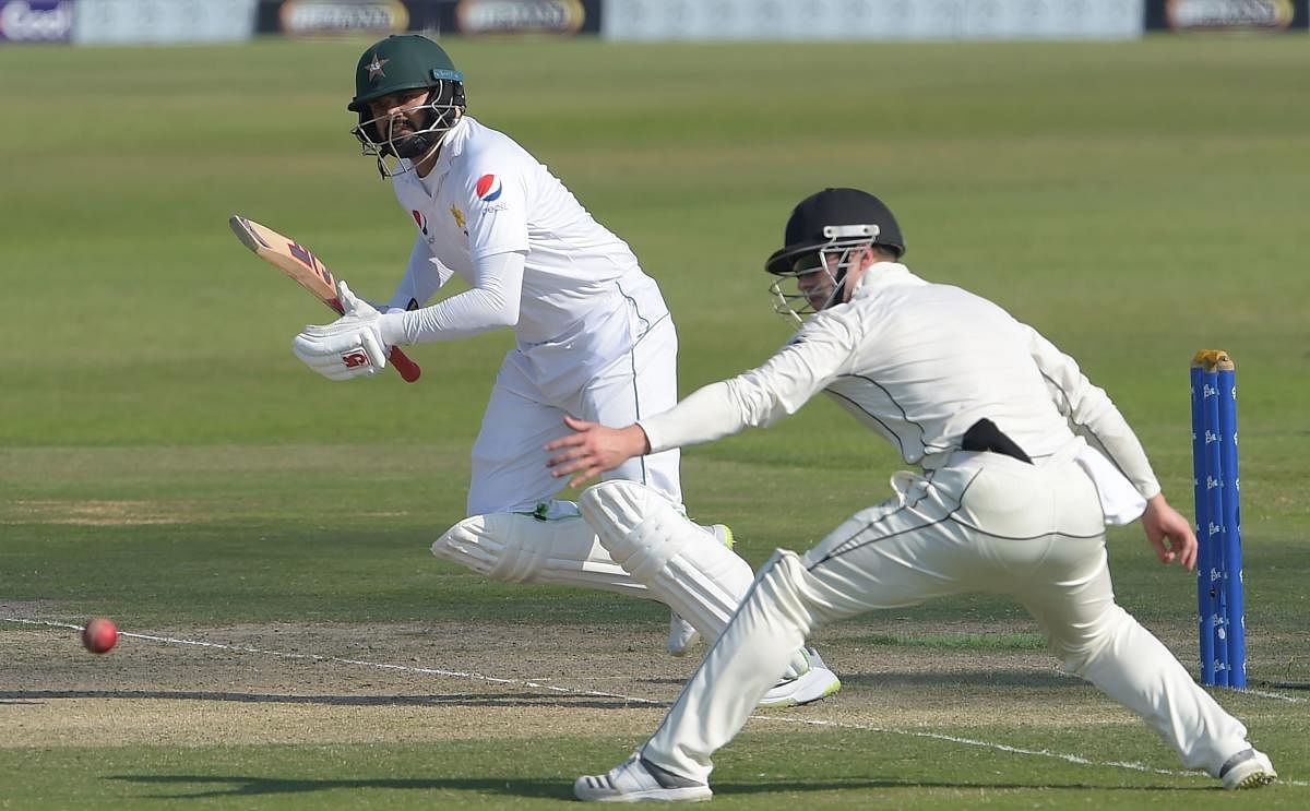 GUTSY: Pakistan's Azhar Ali (left) en route to his unbeaten 62 against New Zealand on the second day of the third Test against New Zealand on Tuesday. AFP