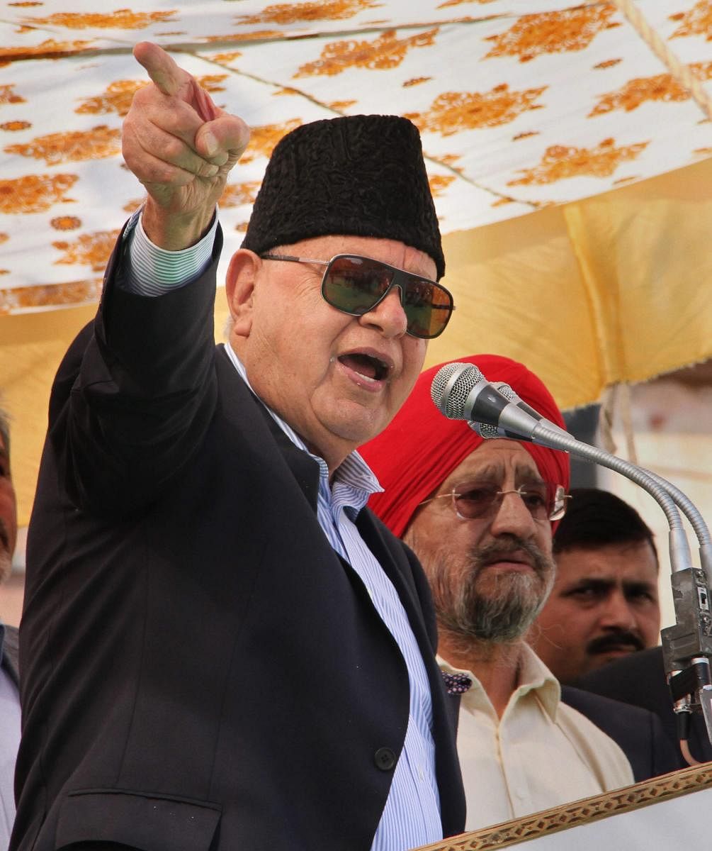 National Conference President Farooq Abdullah addresses a joining function for new party members, in Jammu, Sunday, March 17, 2019. (PTI Photo)
