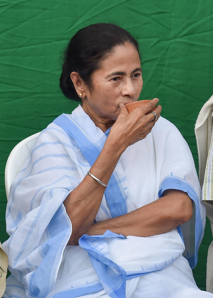 West Bengal Chief Minister and TMC supremo Mamata Banerjee drinks tea from a 'kulhad' at the venue where the preparation are going on for commemoration on the eve of Martyrs' Day in Kolkata, Saturday, July 20, 2019. July 21 is marked as the Martyrs' Day. 