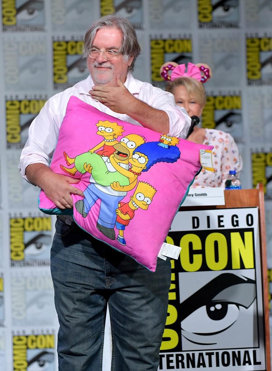 Matt Groening and Yeardley Smith speak at "The Simpsons" Panel during 2019 Comic-Con International at San Diego Convention Center on July 20, 2019 in San Diego, California. Amy Sussman/Getty Images/AFP