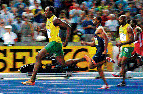 Lightning streak: Usain Bolt during his world record run in Berlin in 2009. AFP