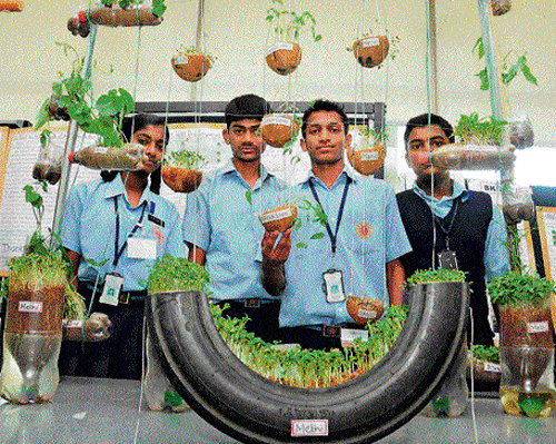 ingenious creations: Students show off their exhibits at the Science Fair 'Prabodhana' at Whitefield on  Saturday.DH photo