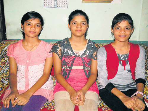Triplet sisters-Sherona, Merlin and Sophia-who have scored almost similar marks in the PU science examination. DH photo
