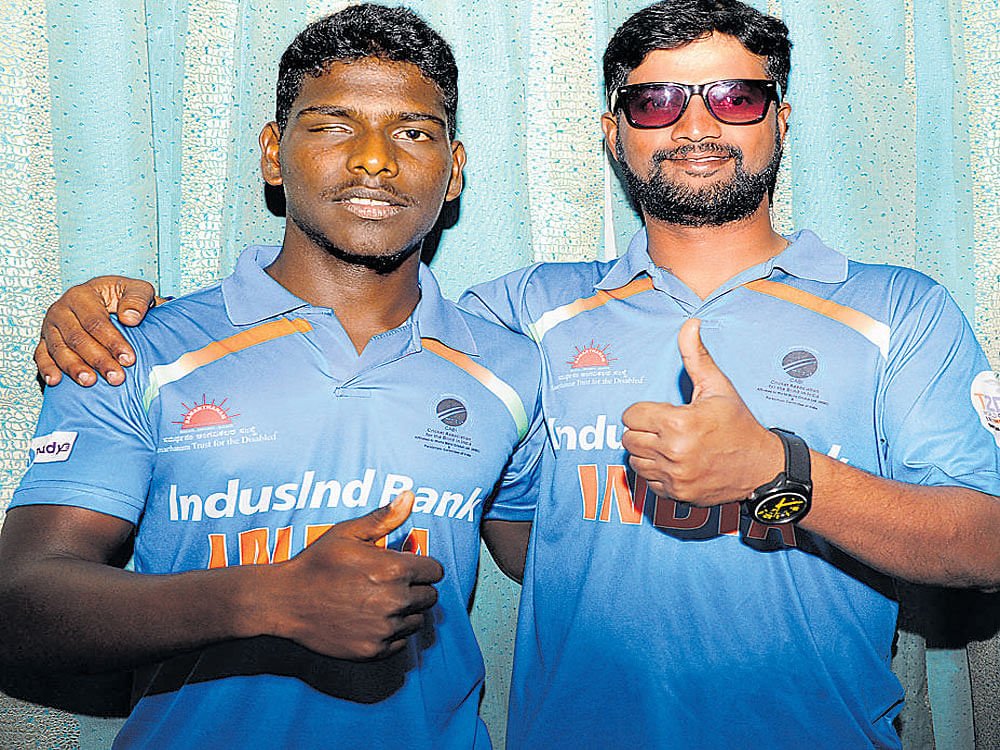 HONOURED Sunil R (left) and Prakash Jayaramaiah at the felicitation function for the Indian blind cricket team. DH PHOTO