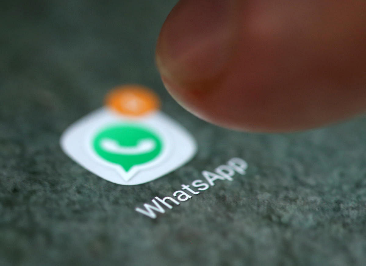WhatsApp app logo is seen on a smartphone. REUTERS File Photo