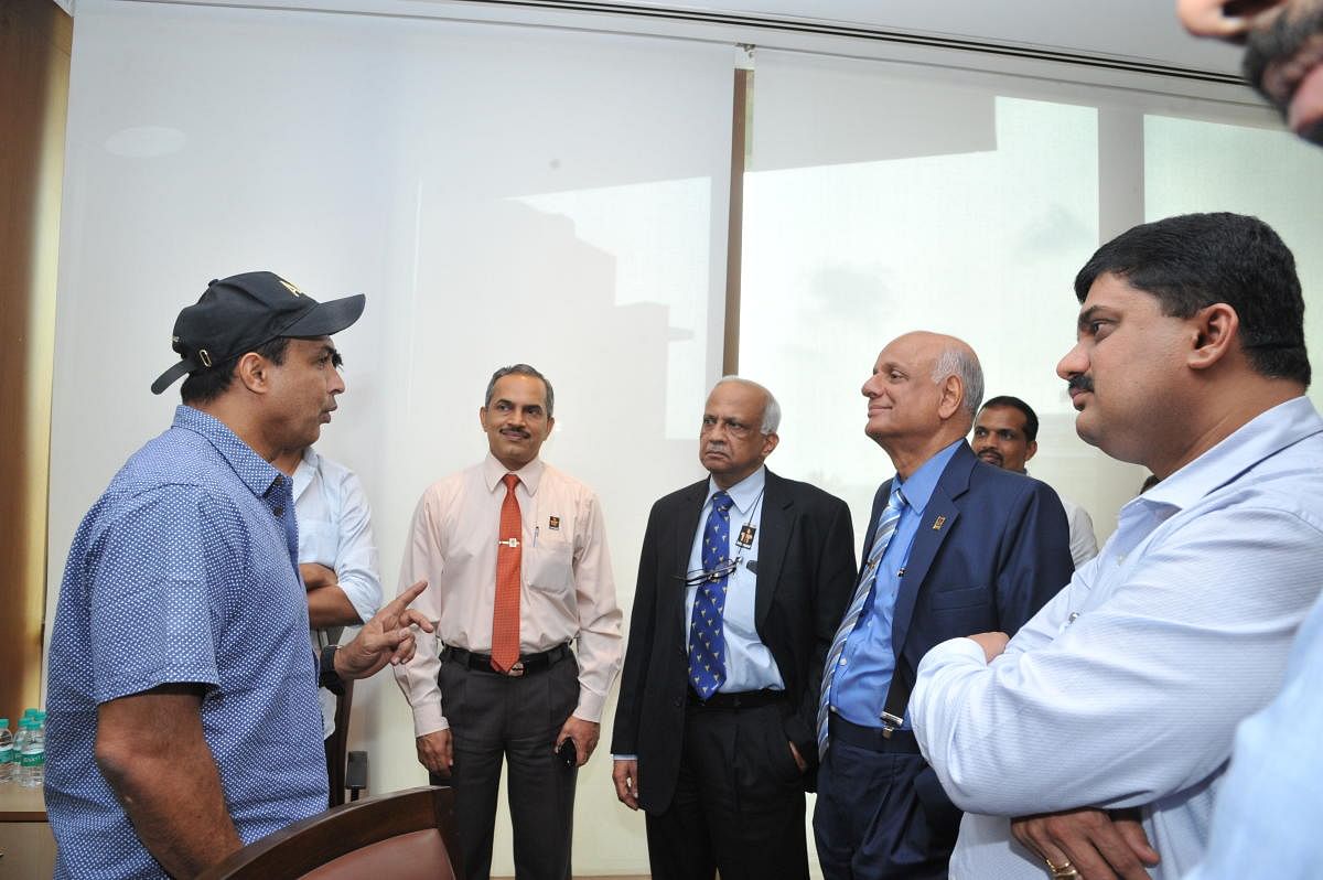 Former India cricketer Robin Singh makes a point to the officials of Manipal Academy of Higher Education at a meeting in the University in Manipal.