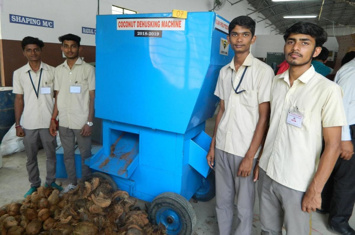Students of the Mechanical Engineering Department of SDM College, Ujire, showcase their innovation - a coconut dehusking machine - during ‘Anveshane-19’, the state-level exhibition organised by Halligattu Coorg Institute of Technology in Gonikoppa.