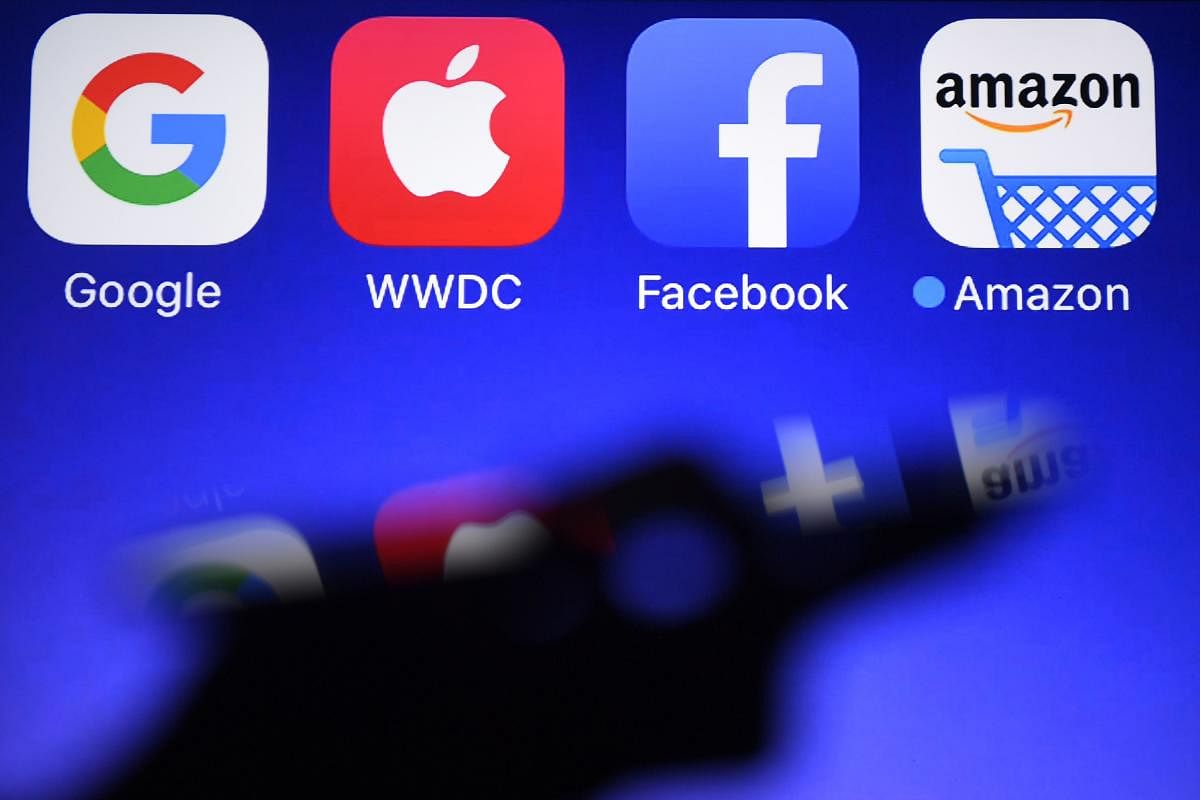 Internet giants like Facebook, Google and Amazon have disrupted markets and culture in a lucrative rise to power. (AFP Photo)