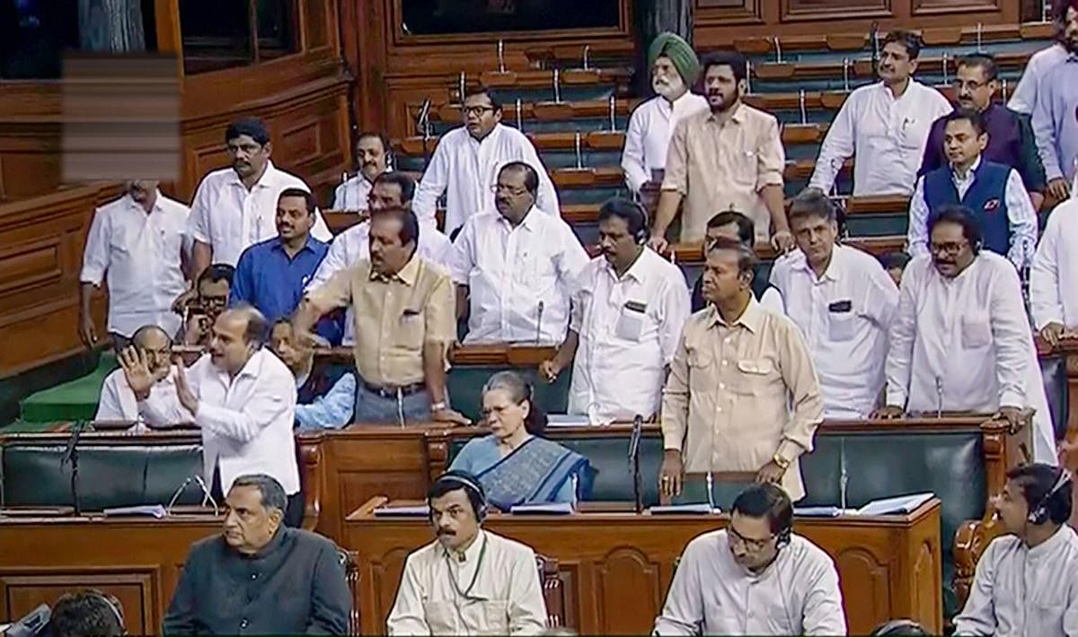 Opposition Congress members in the Lok Sabha (PTI File Photo)