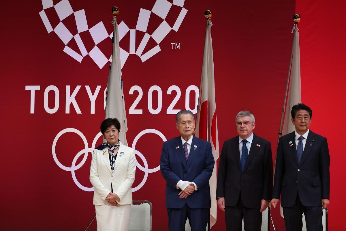 Tokyo entered the final leg of its marathon Olympic preparations, marking a year until the 2020 Games open with officials promising a high-tech but eco-friendly event. (AFP Photo)