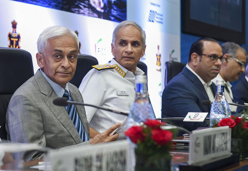 Navy Chief Admiral Karambir Singh (C), Retired Navy chief Admiral Sunil Lanba (L) and FICCI President Sandip Somany attend the international seminar on 'Nation Building Through Shipbuilding’, in New Delhi. (PTI Photo)