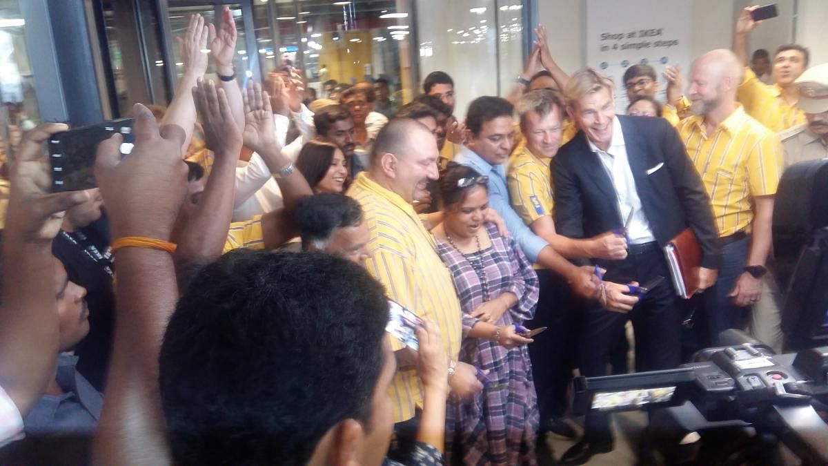 IKEA's first customer at its first store in India, Rajni Venugopal, inaugurates the facility by cutting the ribbon, in Hyderabad on Thursday. (DH Photo/JBS Umanadh)