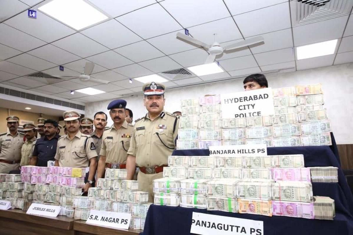  Hyderabad Commissioner of Police Anjani Kumar with the bundles of seized cash Rs 4.92 crore