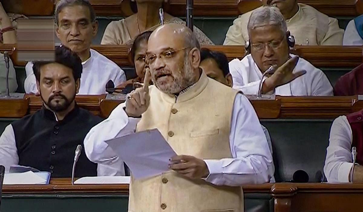 Union Home Minister Amit Shah speaks in the Lok Sabha during the Budget Session of Parliament in New Delhi, Wednesday, July 24, 2019. PTI