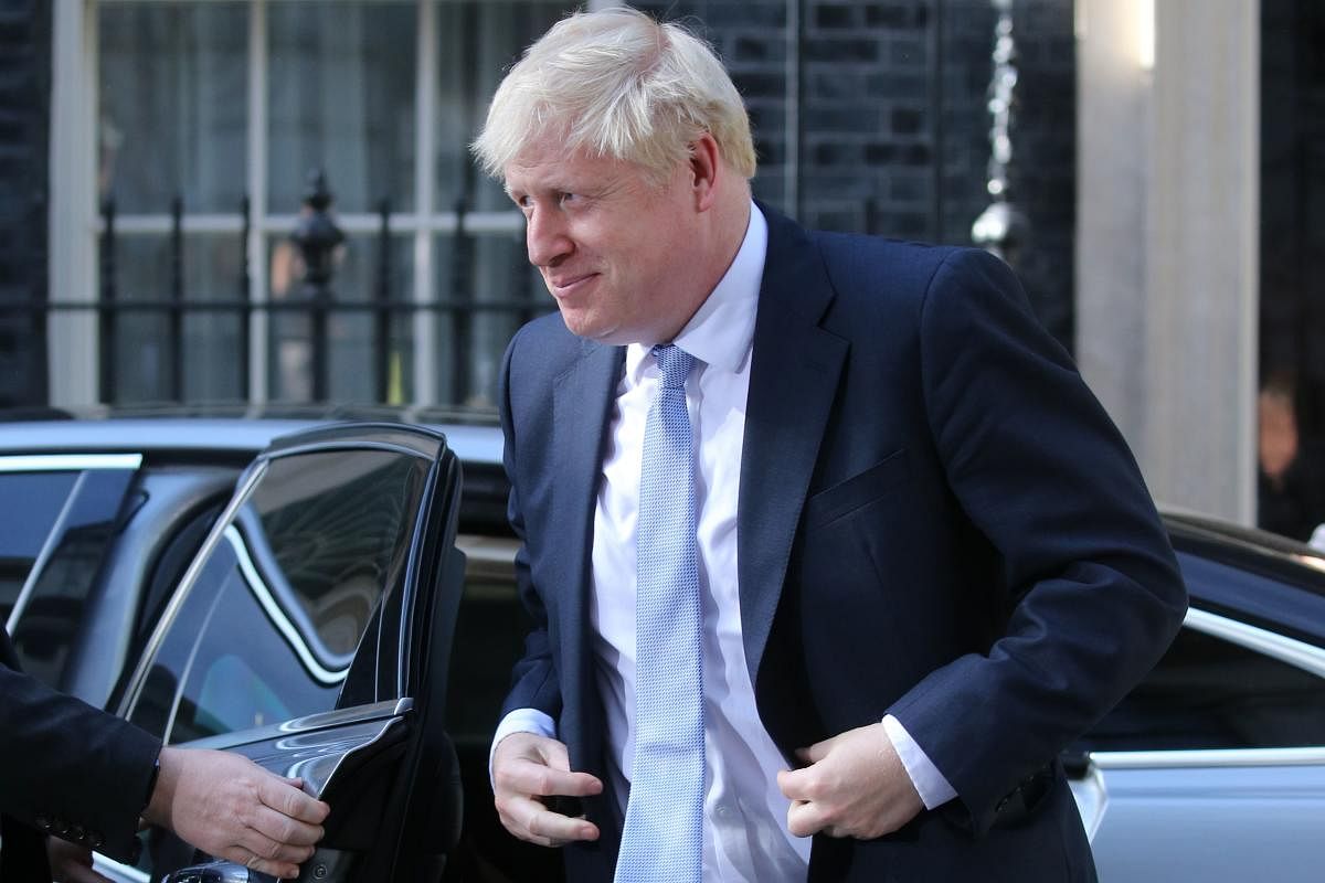 Britain's new Prime Minister Boris Johnson arrives back at 10 Downing Street in London (AFP Photo)