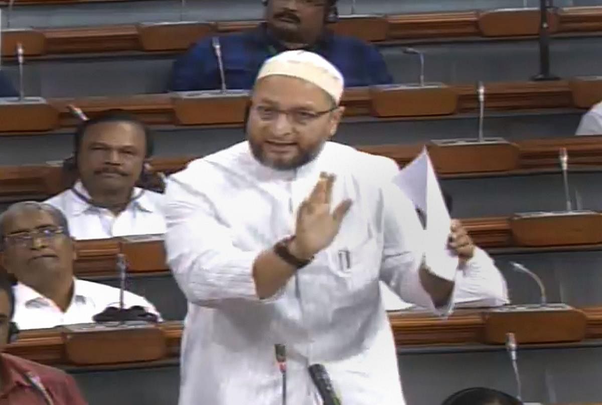 AIMIM MP Asaduddin Owaisi speaks in the Lok Sabha during the Budget Session of Parliament, in New Delhi. "You want to destroy the institution of marriage and bring the women on the road," he said.  (LSTV/PTI Photo)