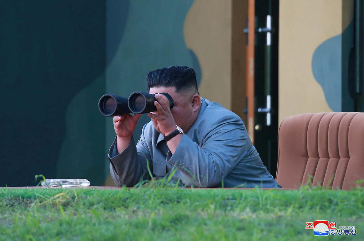 North Korean leader Kim Jong Un watches the test-fire of two short-range ballistic missiles on Thursday, in this undated picture released by North Korea's Central News Agency (KCNA) on July 26, 2019. (KCNA/via REUTERS)