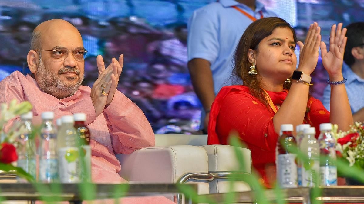 File picture of BJYM Chief Poonam Mahajan with  BJP National President Amit Shah. Photo credit: PTI