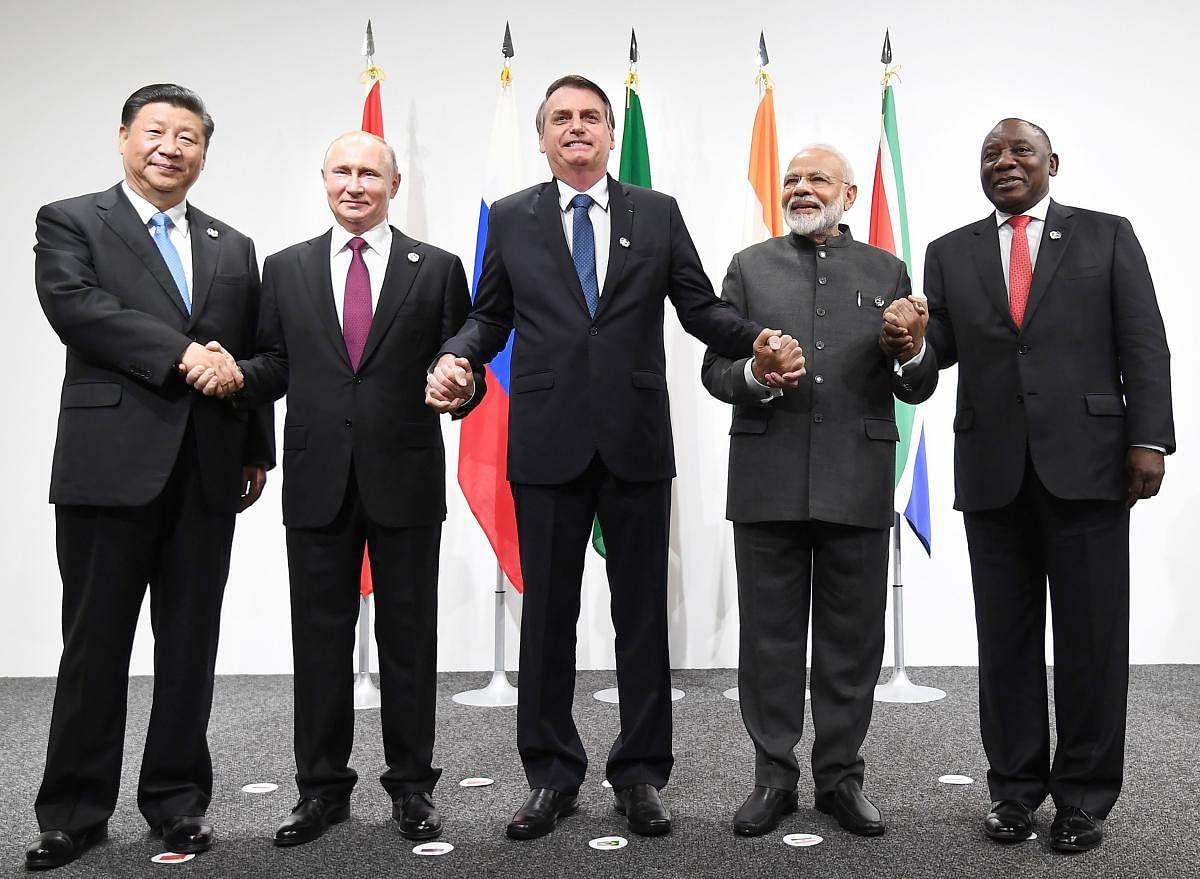 Prime Minister Narendra Modi with the leaders of BRICS nations, in Osaka, Japan. (PTI Photo)