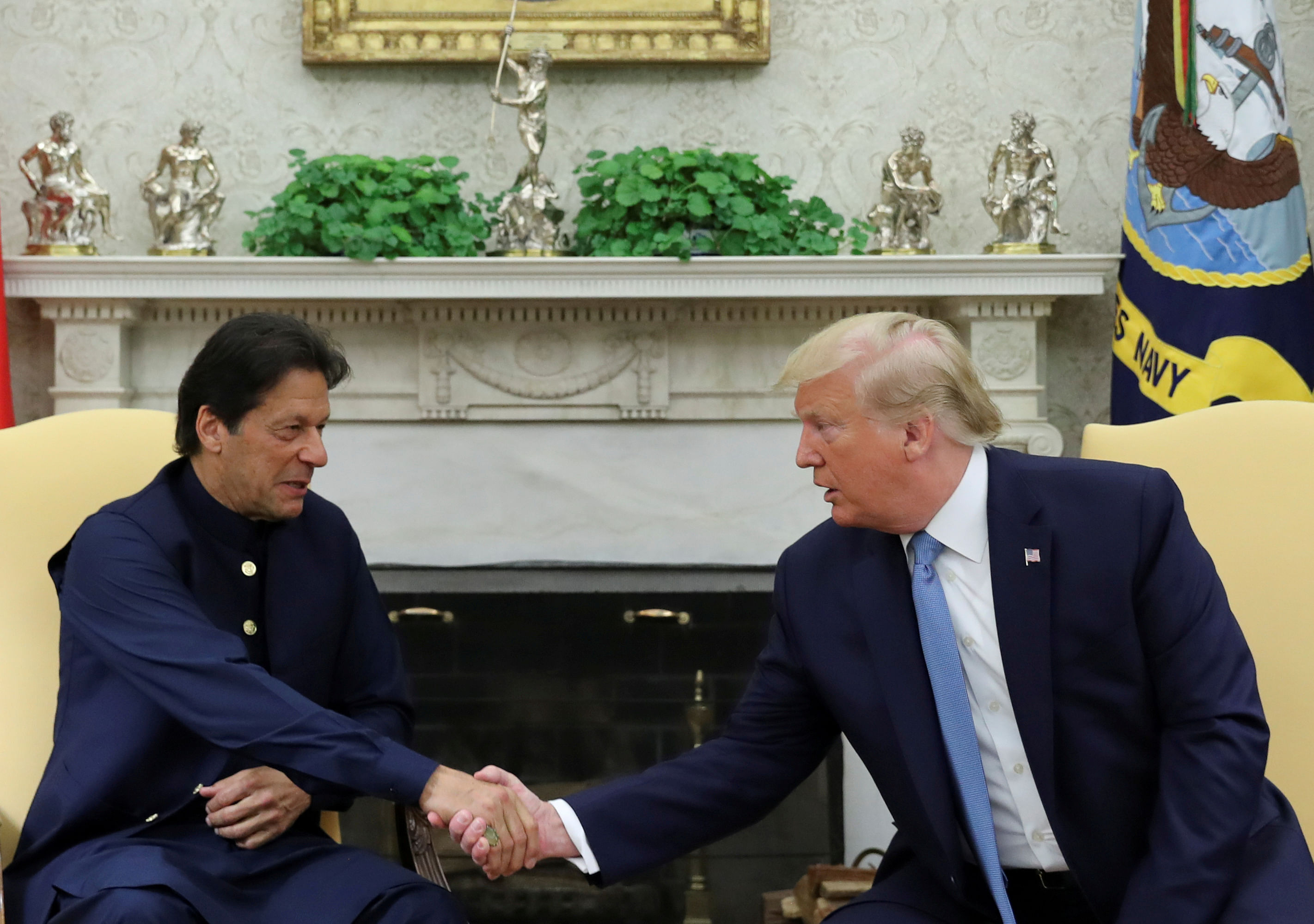 U.S. President Donald Trump greets Pakistan's Prime Minister Imran Khan in the Oval Office at the White House in Washington. (Reuters Photo)