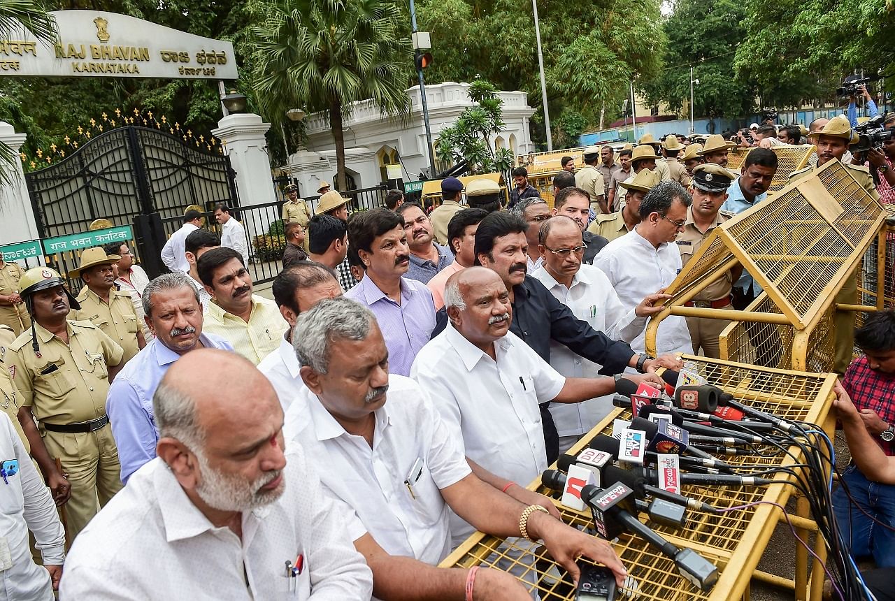 Former JD(S) president and rebel MLA A H Vishwanath (C) said the rebels will approach Supreme Court challenging the decision