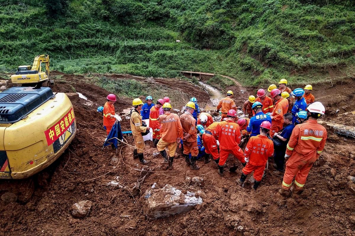 Official news agency Xinhua said Saturday night that 40 people have been rescued from the site in Shuicheng county, Guizhou province, according to the local emergency rescue command. (AFP Photo)