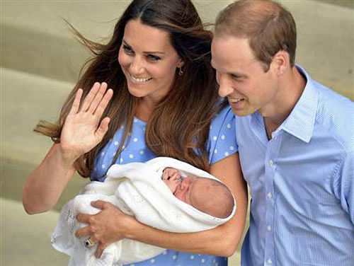Britain's Catherine, Duchess of Cambridge, holds her baby son outside the Lindo Wing of St Mary's Hospital before leaving with Prince William, in central London July 23, 2013. Reuters