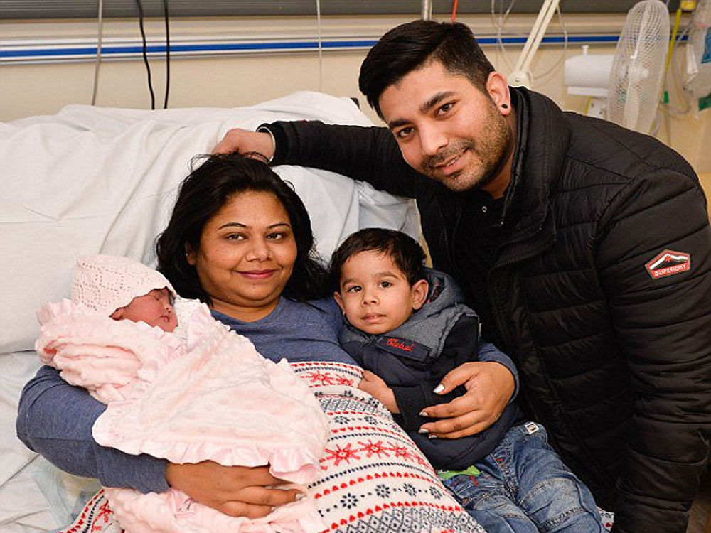 35-year-old Bharti Devi, gave birth to the 6 pounds, 8 ounce baby girl Ellina Kumari at City Hospital in Birmingham, just seconds after Big Ben stopped chiming. Image courtesy SWBH NHS Trust/Twitter