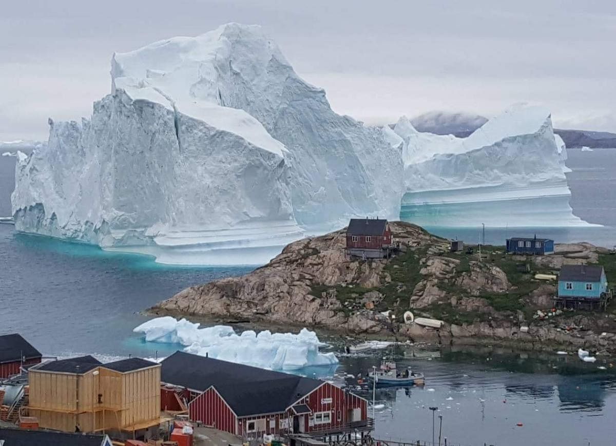 As Europe's record-breaking heatwave drifts towards the Arctic it threatens to accelerate the melting of ice in Greenland, which already started earlier than normal this year, climate scientists warned Saturday. (AFP Photo)