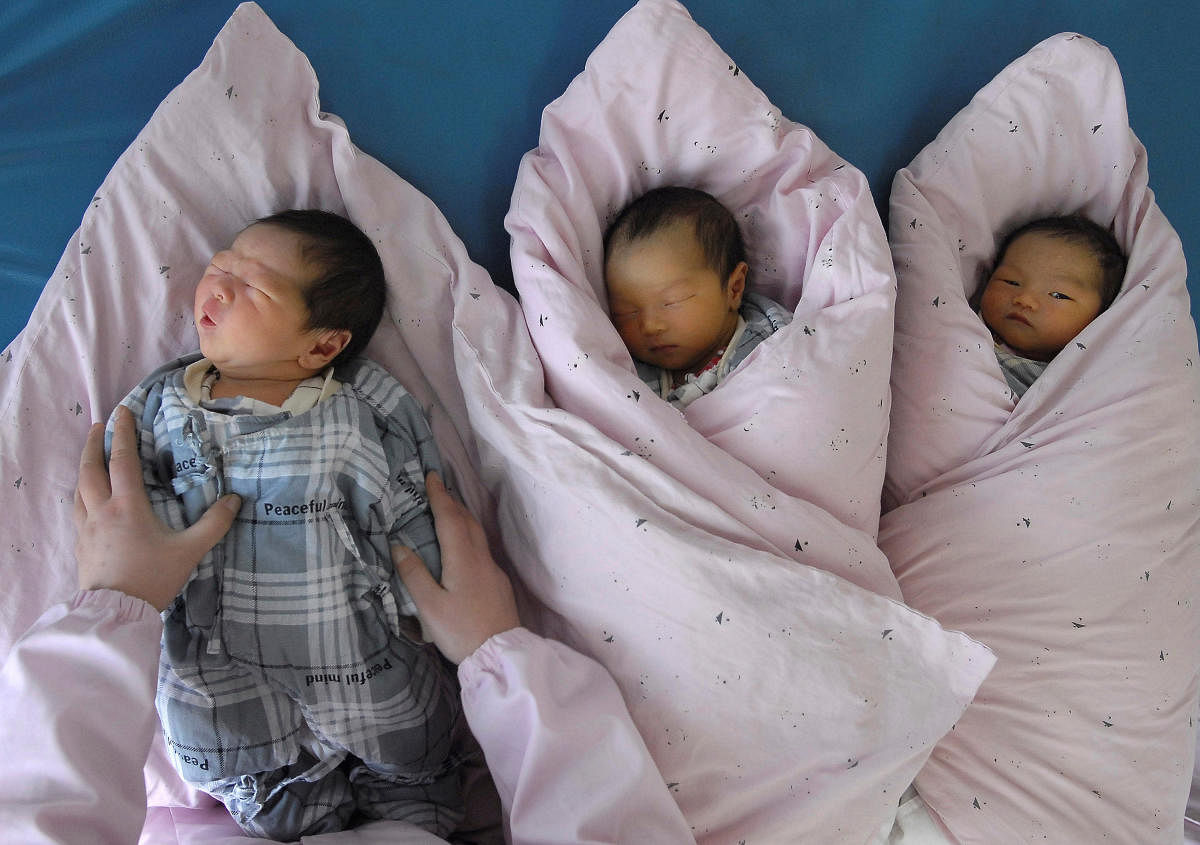A nurse takes care of new-born infants at a hospital. REUTERS File photo