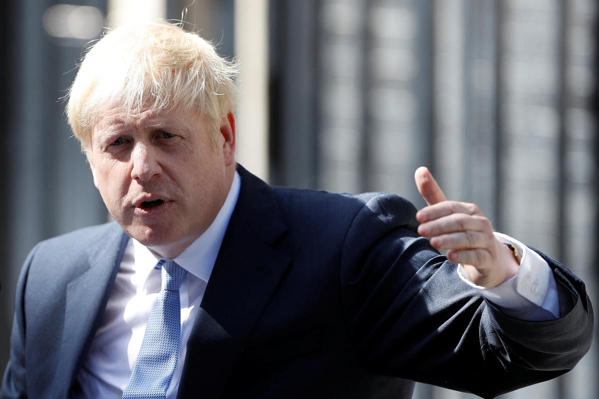 Britain's new Prime Minister Boris Johnson moved into Downing Street on Monday with his girlfriend Carrie Symonds, becoming the first unmarried couple to live in the world-famous address in London. (Reuters Photo)