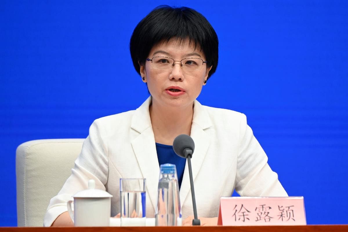 Xu Luying, spokesperson for mainland China's Hong Kong and Macao Affairs Office (HKMAO) of the State Council, speaks concerning the ongoing protests in Hong Kong, at a press conference in Beijing on July 29, 2019. AFP