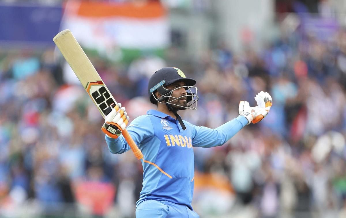 Ravindra Jadeja celebrates as he makes a statement with his half-century in the World Cup semi-final against New Zealand. Credit: AP