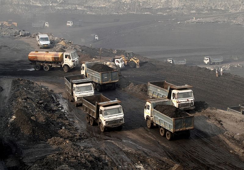 Trucks move in the Mahanadi coal fields, near Talcher town in the eastern state of Odisha, India. (Reuters)