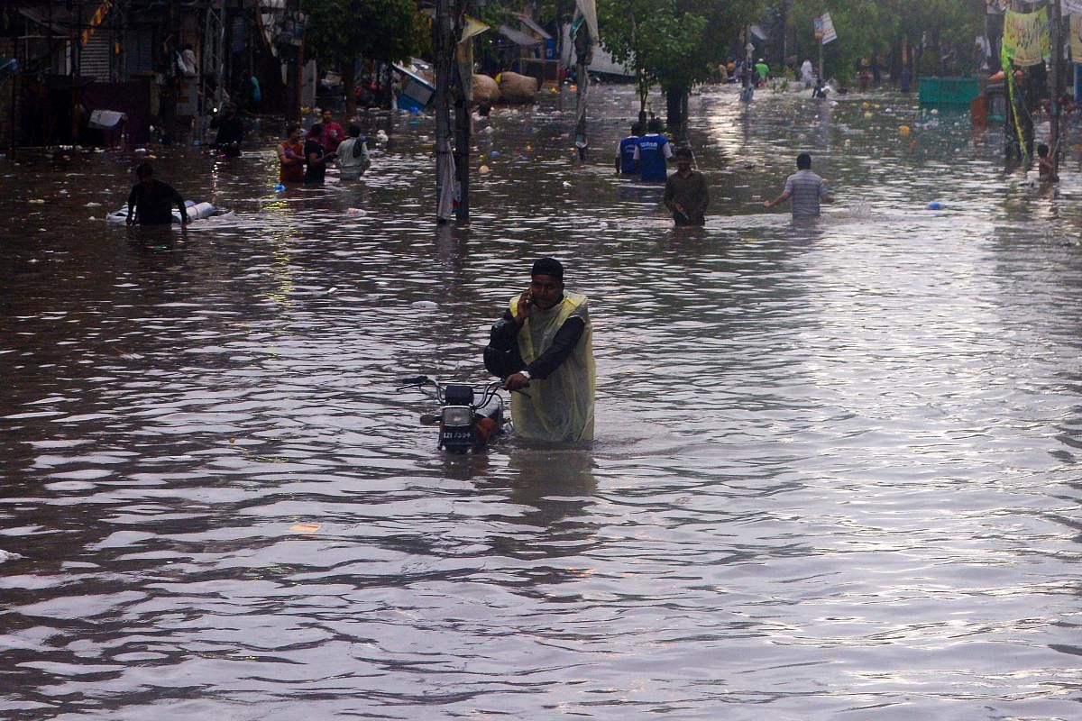 Flash floods caused due to torrential rains in northwest Pakistan have killed at least 16 people, including children, an official said on Tuesday. (Photo AFP)