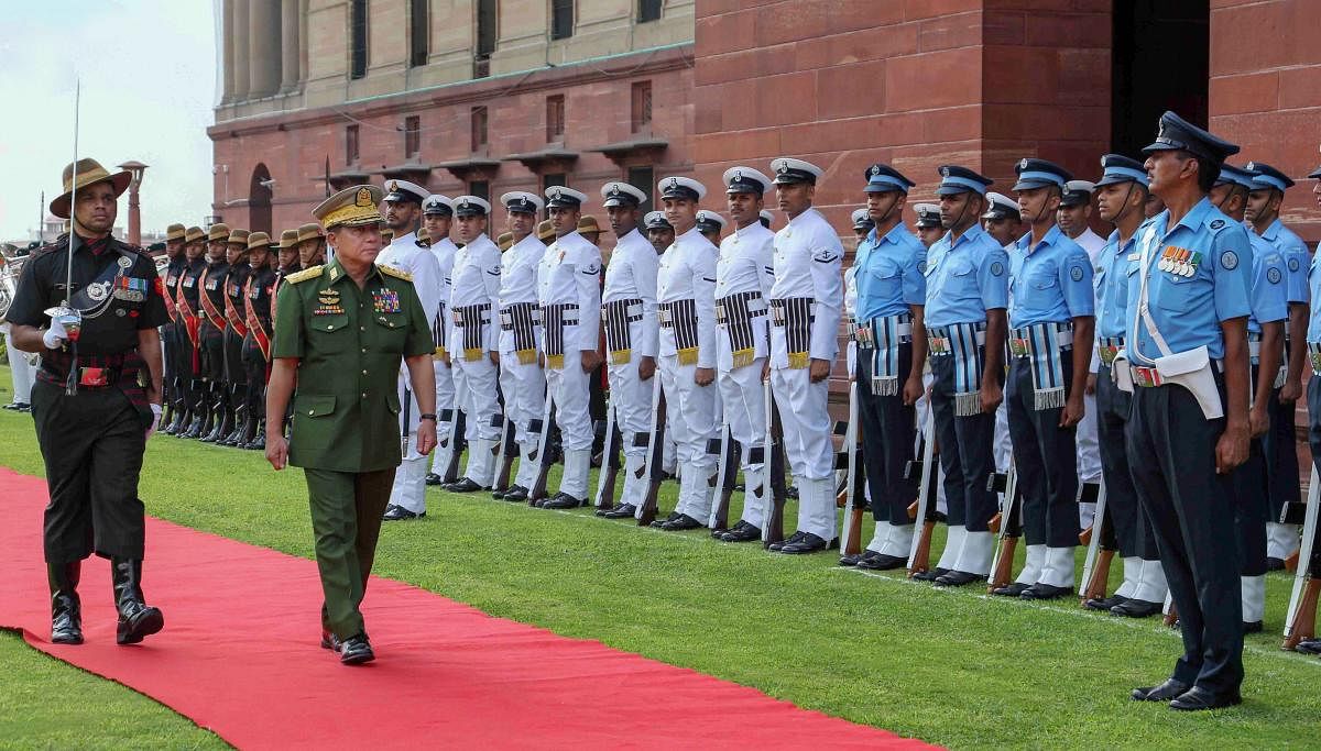Myanmar's Commander-In-Chief of Defence Services Senior General Min Aung Hlaing inspects the Tri-Services guard of honour at South Block in New Delhi, on July 29, 2019. PTI