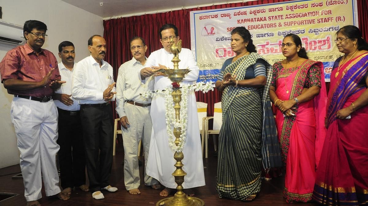 St Mary’s Special School Correspondent Fr Matthew Patrick Vas inaugurates a meet organised by Karnataka State Special School Educators and Non-educators Association at Shyamili Hall in Ambalpadi. 