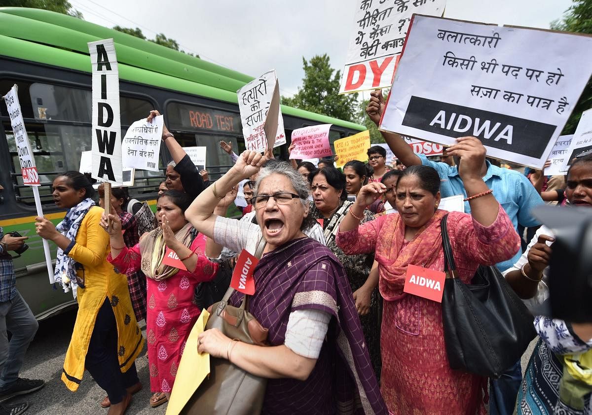 Women activists stage a protest demonstration over the Unnao case. (PTI)