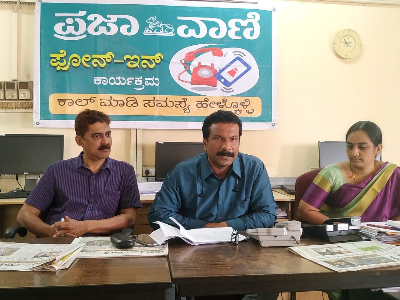 District Vector Borne Disease Control Officer Dr Naveenchandra Kulal speaks during phone-in programme organised by Prajavani, at DH-PV editorial office in Balmatta on Tuesday. MCC Deputy Commissioner (Revenue) Gayathri Nayak and District Ayush Officer Dr Iqbal look on. (DH Photo)
