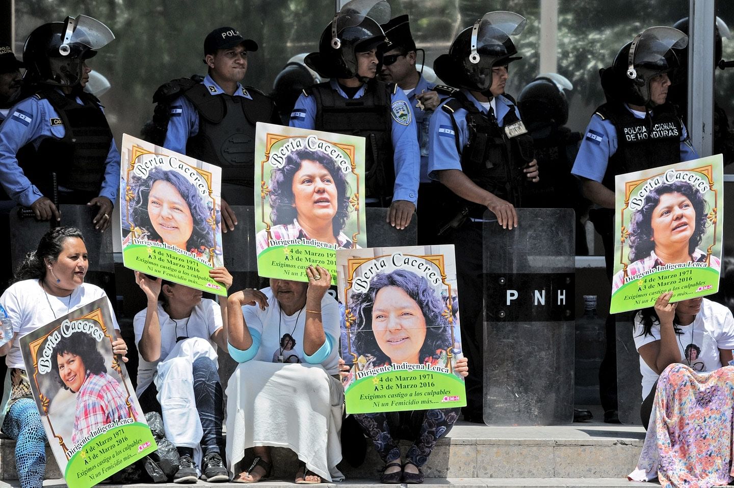 Human rights activists take part in a protest to claim justice after the murdered of indigenous activist leader Berta Cáceres in Tegucigalpa on March 17, 2016.   