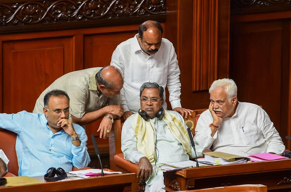 Former chief minister Siddaramaiah, Karnataka Congress chief Dinesh Gundu Rao, and other MLA's (PTI Photo)