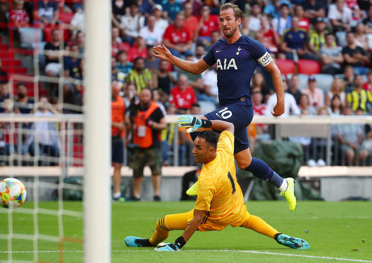 Tottenham's Harry Kane scores their first goal against Real Madrid in Munich (Reuters Photo)