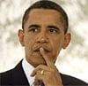 US President Barack Obama pauses before a meeting on Thursday in  L'Aquila, Italy. AP