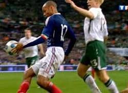 TV grab shows French forward Thierry Henry controlling the ball with his palm during the World Cup 2010 qualifying football match against Republic of Ireland on Nov 18, 2009 at the Stade de France in Saint-Denis, northern Paris. AFP