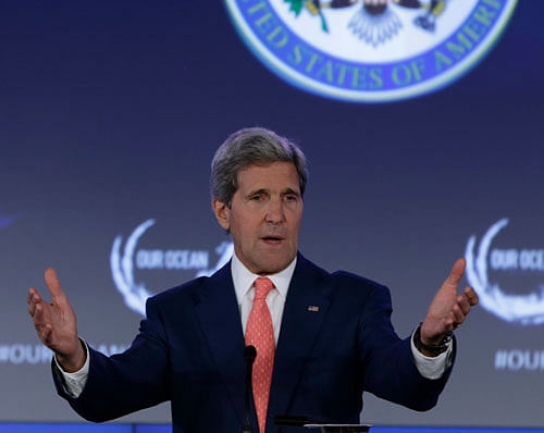 U.S. Secretary of State John Kerry delivers opening remarks at the 'Our Ocean' conference at the State Department in Washington June 16, 2014. The United States is considering U.S. air strikes to help the Iraqi government fend off an Islamist insurgency as well as possible discussions with neighboring Iran, Kerry said on Monday. REUTERS