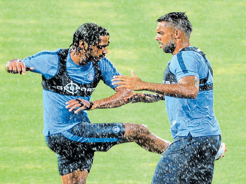 KICKANDPUNCH: India's Sandesh Jhingan (left) and Robin Singh go through the training drills during a practice session. DH photo